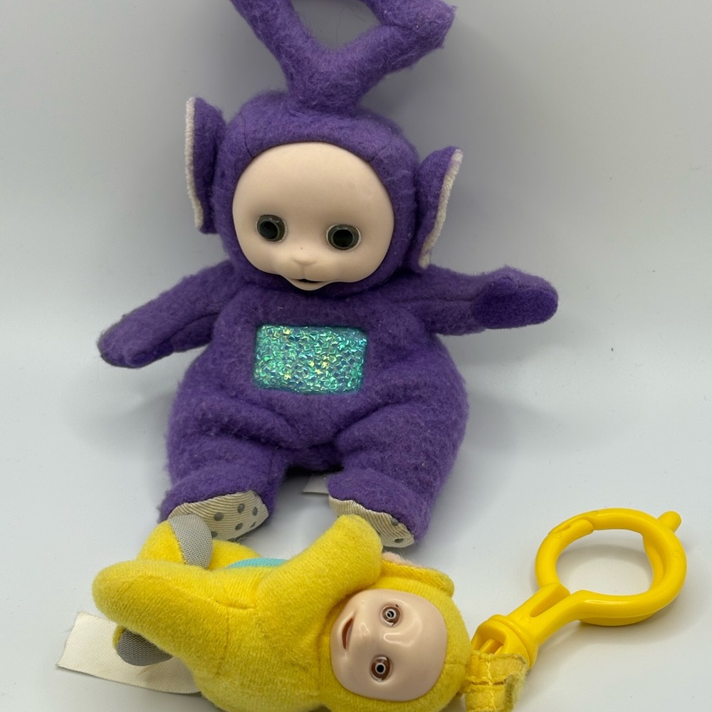 VTG lot Tinky Winky Purple Teletubby 6.5” plush and yellow Teletubby purse clip